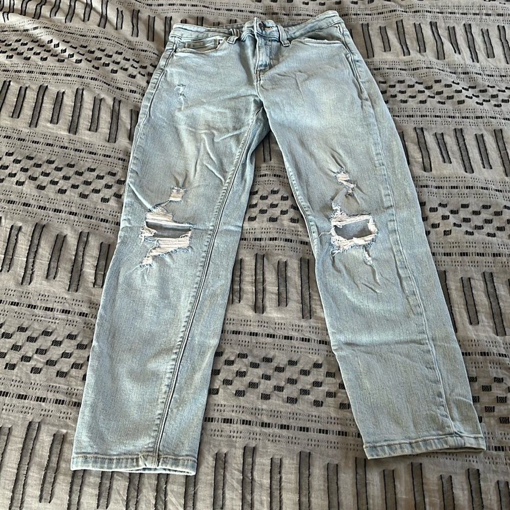 Light ripped straight legged jeans